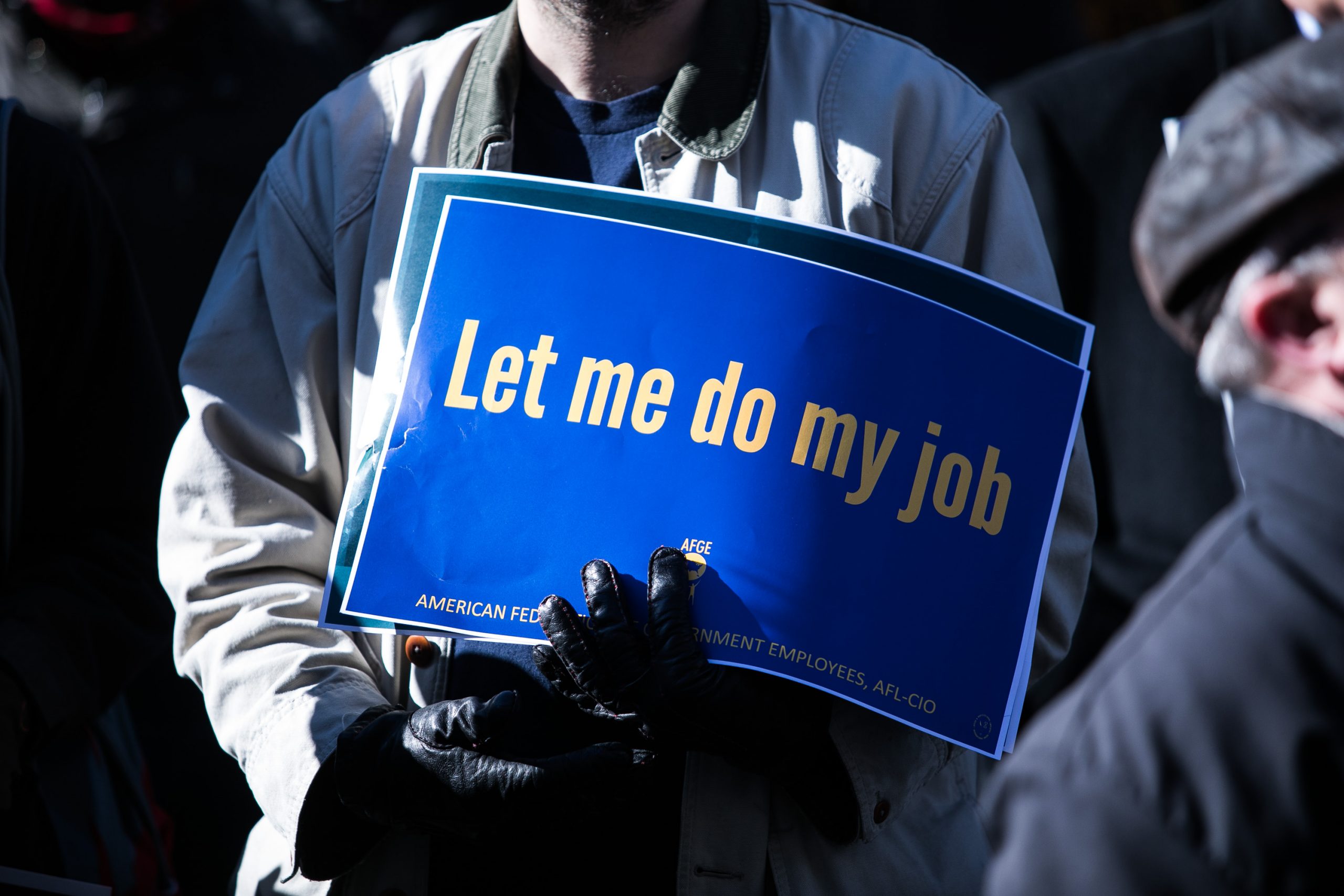 Union members and other federal employees rally to call for an end to the partial government shutdown on Thursday outside the White House. 