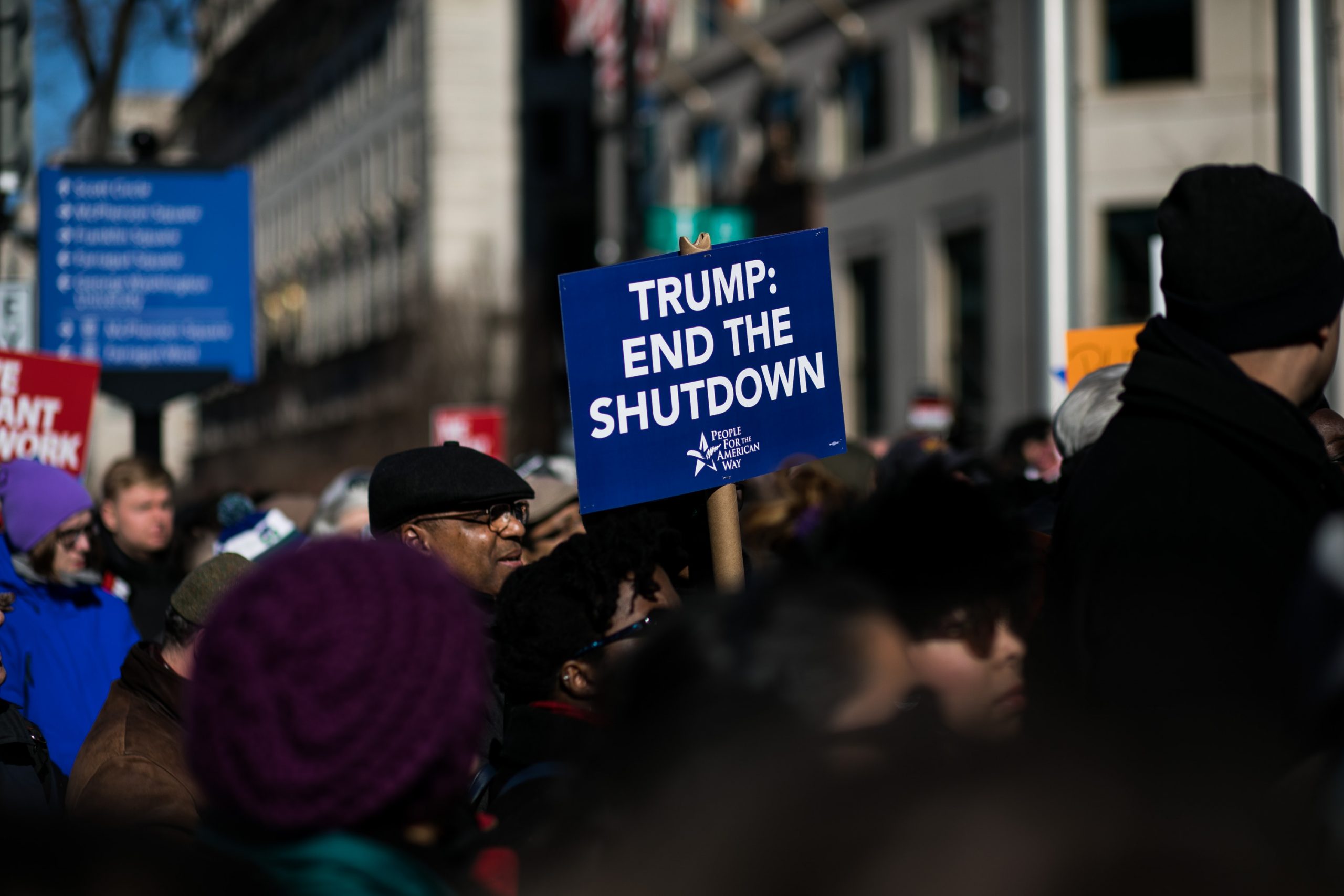 Union members and other federal employees rally to call for an end to the partial government shutdown on Thursday outside the White House. 