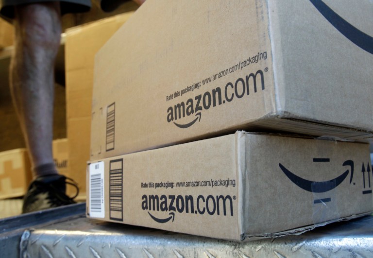 The next Amazon might be in someone's garage today - unless Amazon lobbyists keep those companies from ever taking off. (AP Photo/Paul Sakuma, File)