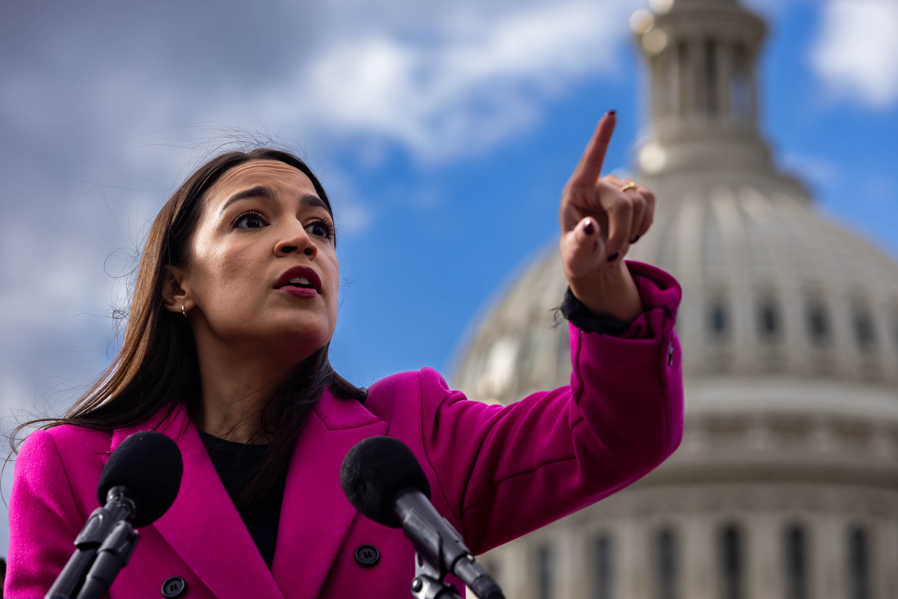 Rep. Alexandria Ocasio-Cortez (D-NY) speaks during a news conference outside the US Capitol, on Thursday, Jan. 26, 2023. The number of asylum-seekers crossing the southern border has surged in recent months as the Biden administration committed to increase funding available to cities receiving migrants and to expand coordination.