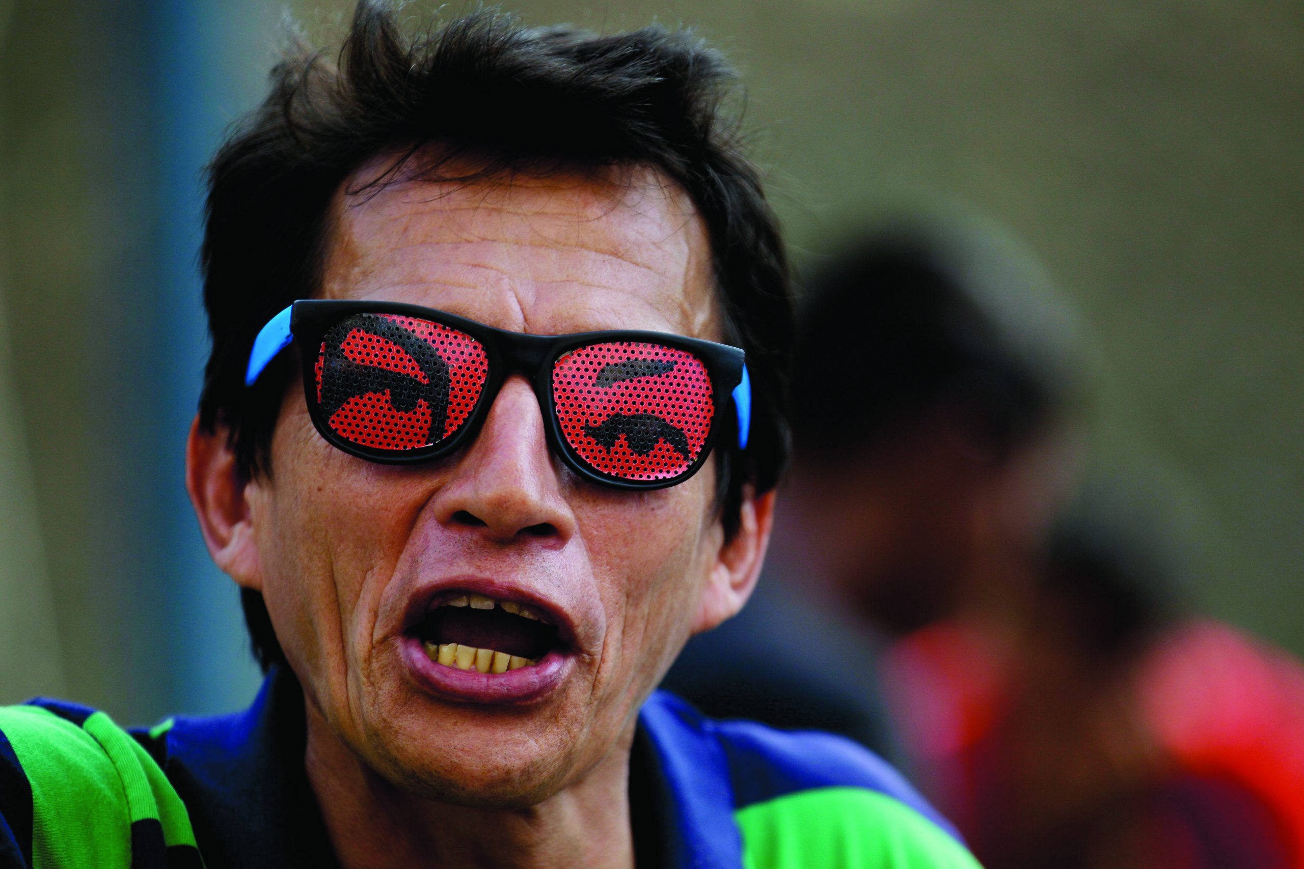 Absent but omnipresent, Hugo Chavez a powerful symbol