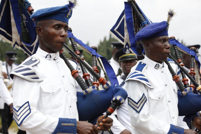 The Nigerian police band march during the 54th anniversary celebrations of Nigerian independence, in Lagos, Nigeria, Wednesday, Oct. 1, 2014. (AP Photo/Sunday Alamba)
