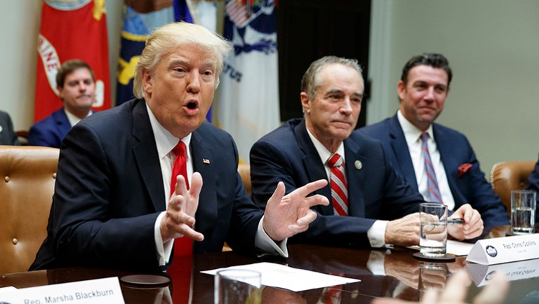 President Trump, accompanied by Rep. Chris Collins, R-N.Y., discuss the healthcare deal. More House conservatives are embracing a deal to partially repeal and replace Obamacare, placing heavy pressure on wary Republican centrists to support the compromise legislation as early as this week. (AP Photo/Evan Vucci, File)