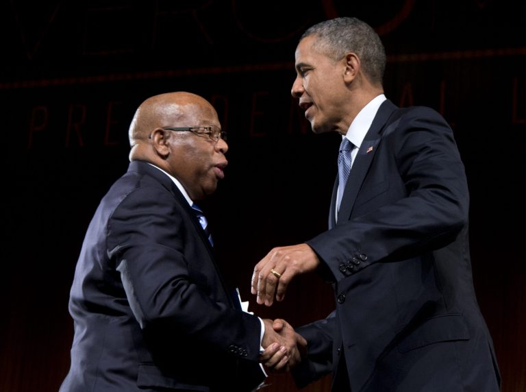 FILE- This April 10, 2014 file photo shows President Barack Obama greeted by Rep. John Lewis, D-Ga., as he arrives to speak at the LBJ Presidential Library in Austin, Texas. A civil rights icon who is now an influential member of the House became the latest prominent Democrat on Monday to oppose one of President Barack Obama's picks to become a federal judge. A strongly worded three-paragraph statement by Lewis dealt yet another embarrassing blow to Obama and his selection of Michael Boggs to become a federal district judge in Lewis' home state of Georgia. (AP Photo/Carolyn Kaster, File)