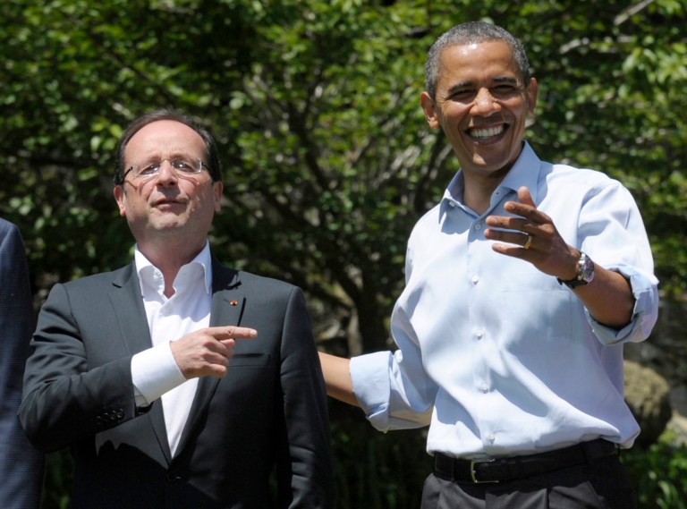 FILE - In this May 19, 2012 file photo, French President Francois Hollande, left, answers a question with President Barack Obama during a photo opportunity at the G-8 Summit at Camp David, Md. France's suddenly single president arrives Monday Feb. 10, 2014 in the U.S. for a state visit, hoping the glaring absence of his first lady won't steal the limelight from his focus on major policy issues with President Barack Obama. Hollande will be highlighting France's shared interests with Washington on issues like Syria's civil war, Iran's nuclear program and terrorism in Africa. (AP Photo/Susan Walsh, File)