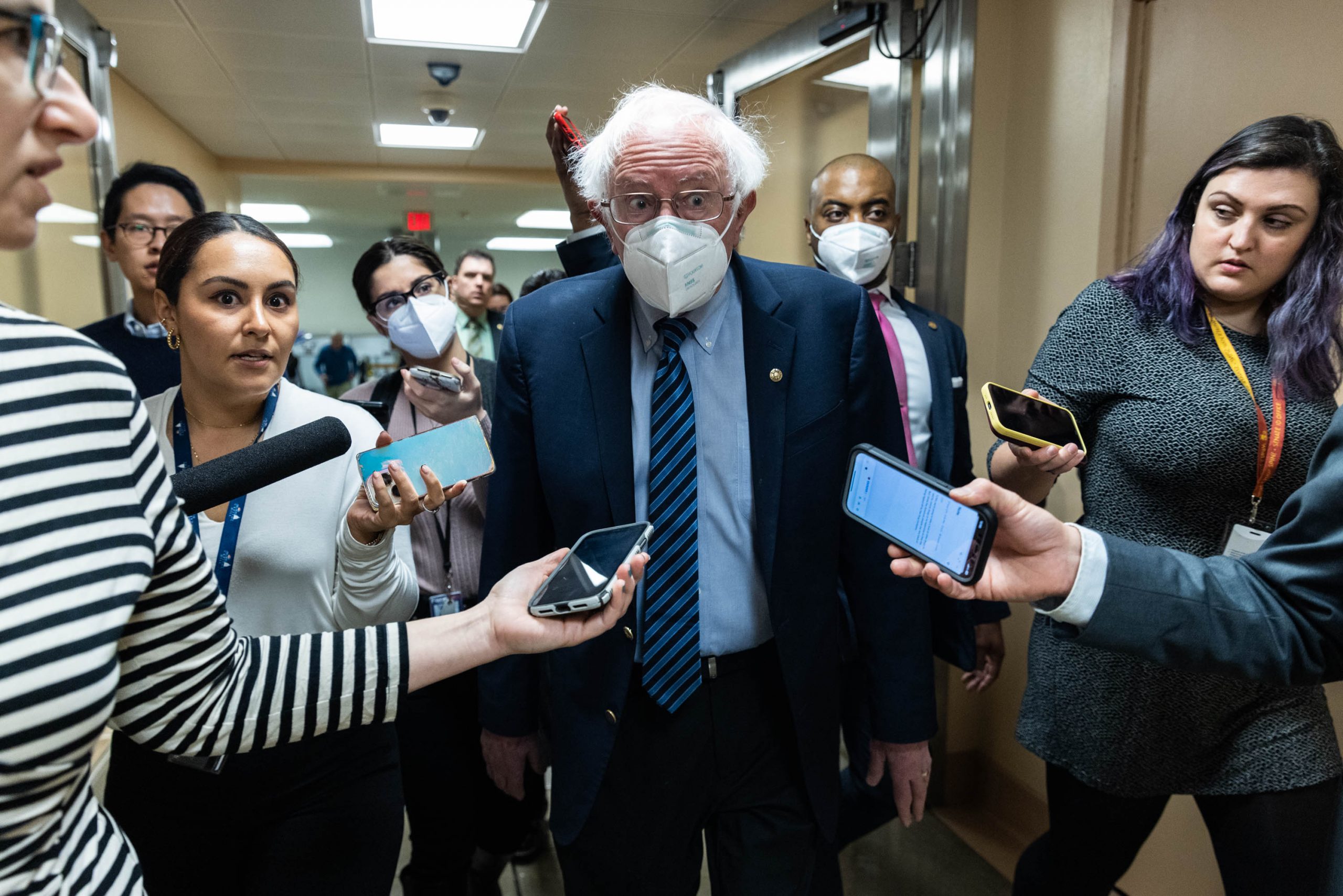 Sen. Bernie Sanders (I-VT) takes questions from reporters in the basement of the Capitol Building on March 14, 2023. Sanders has blamed the Trump Administration's bank deregulation bill that was signed into law in 2018.