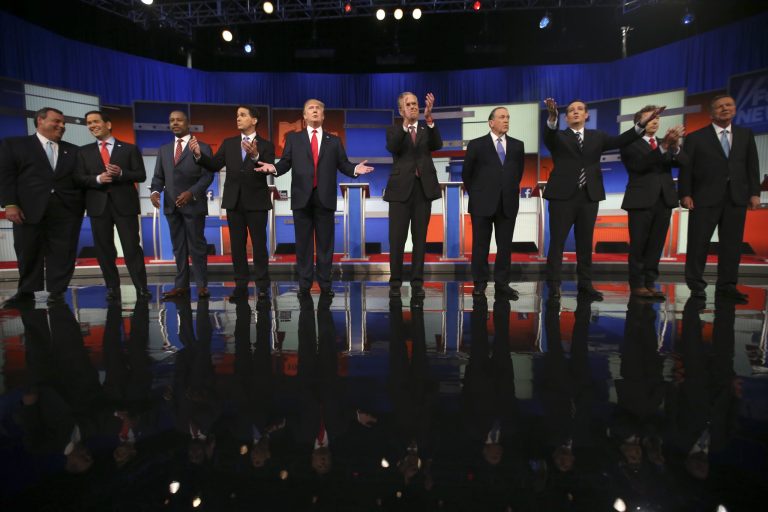 Republican presidential candidates from left, Chris Christie, Marco Rubio, Ben Carson, Scott Walker, Donald Trump, Jeb Bush, Mike Huckabee, Ted Cruz, Rand Paul, and John Kasich take the stage for the first Republican presidential debate at the Quicken Loans Arena Thursday, Aug. 6, 2015, in Cleveland. (AP Photo/Andrew Harnik)