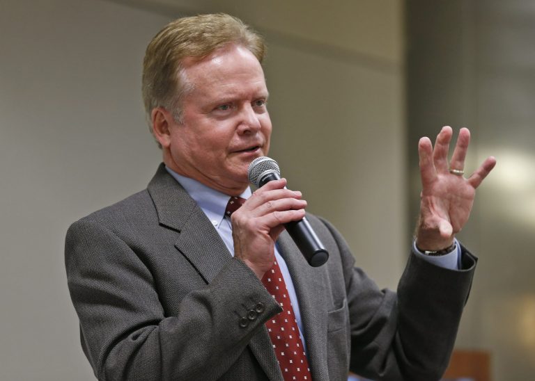 Former US Sen. Jim Webb, D-Va., gestures during a talk at the AP Day at the Capitol in Richmond, Va., Wednesday, Dec. 3, 2014. Webb has formed an exploratory committee to look into his running for the Democratic nomination for president in 2016. (AP Photo/Steve Helber)
