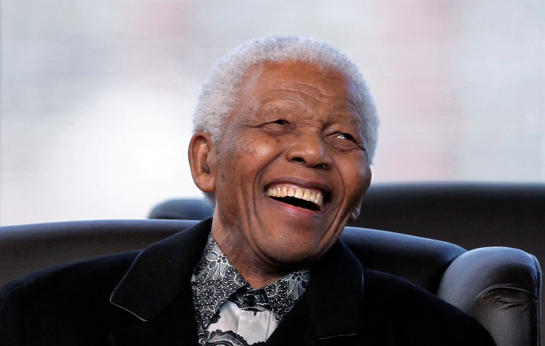 FILE - In this, Saturday, May 9, 2009 file photo, South Africa's former President Nelson Mandela smiles as newly appointed President Jacob Zuma makes his speech during his Inauguration in Pretoria, South Africa. The families of two women who have sought to be recognized as children of Nelson Mandela have contacted the executors of the will of the anti-apartheid leader, but are not seeking money, a lawyer said Monday, Feb. 10, 2014. (AP Photo/Themba Hadebe, Pool, File)