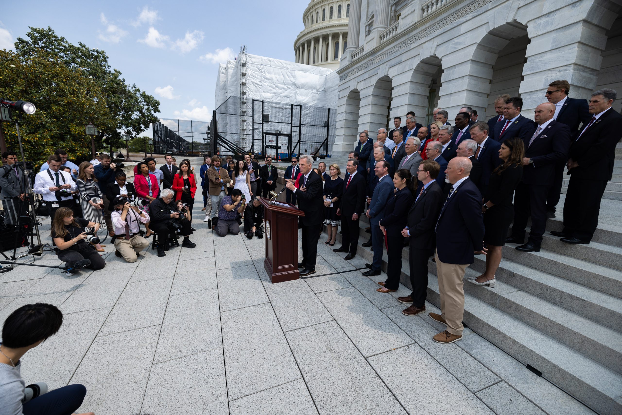 Speaker of the House Kevin McCarthy, accompanied by Senate and House Republicans, speaks at a news conference on the debt ceiling and debt limit negotiations on the west terrace of the Capitol Building, on Wednesday, May 17, 2023. 