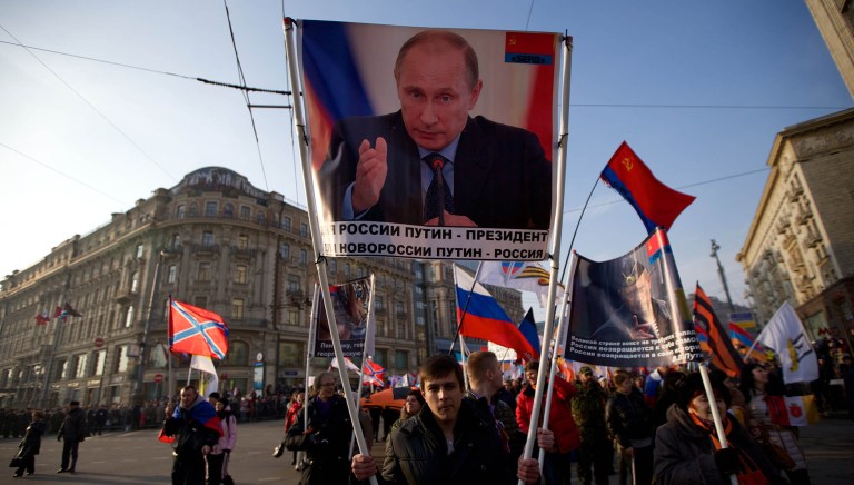 The EU concluded that Russian President Vladimir Putin has ramped up his country's propaganda efforts in the wake of the annexation of Crimea. (AP Photo/ Ivan Sekretarev)
