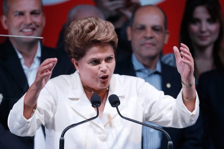 Brazil's President Dilma Rousseff gives her acceptance speech in Brasilia on Sunday. (AP Photo/Eraldo Peres)