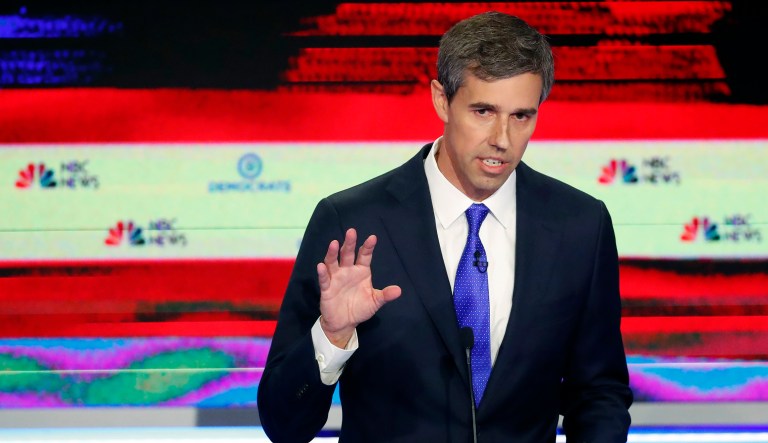 Democratic presidential candidate former Texas Rep. Beto O'Rourke answers a questions as Sen. Elizabeth Warren, D-Mass, listens, during a Democratic primary debate hosted by NBC News at the Adrienne Arsht Center for the Performing Arts, Wednesday, June 26, 2019, in Miami.