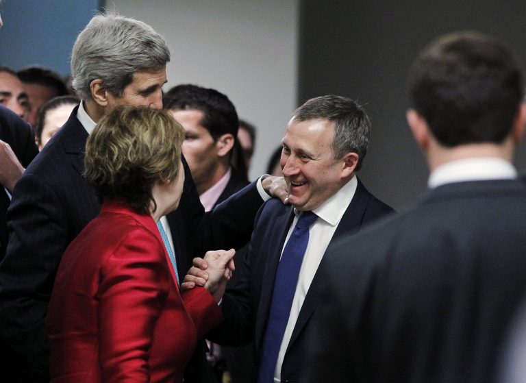 Ukrainian Foreign Minister Andrii Deshchytsia, right, talks with Secretary of State John Kerry and European Union High Representative Catherine Ashton in a hotel hallway behind the scenes to thank them for the results of a quadrilateral meeting on Ukraine that had just ended between representatives of the US, Ukraine, Russia and the European Union, Thursday, April 17, 2014, in Geneva.   (AP Photo/Jim Bourg, Pool)