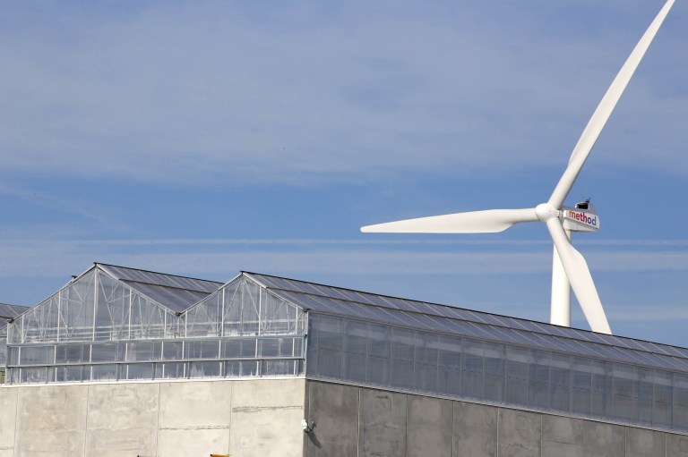 A business group says the wind energy subsidy is working at the expense of emissions-free nuclear. (AP Photo/Martha Irvine)