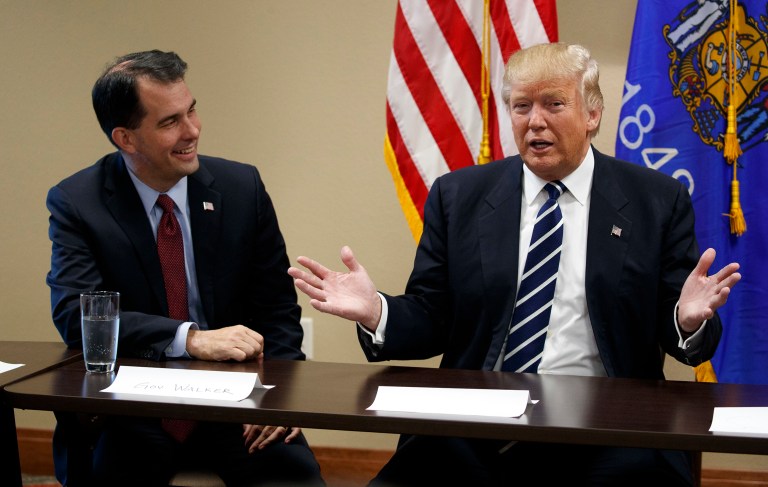 Wisconsin Gov. Scott Walker was one of Trump's adversaries in the GOP presidential primary, but was the first major candidate to drop out before Trump took over the race. (AP Photo/ Evan Vucci)
