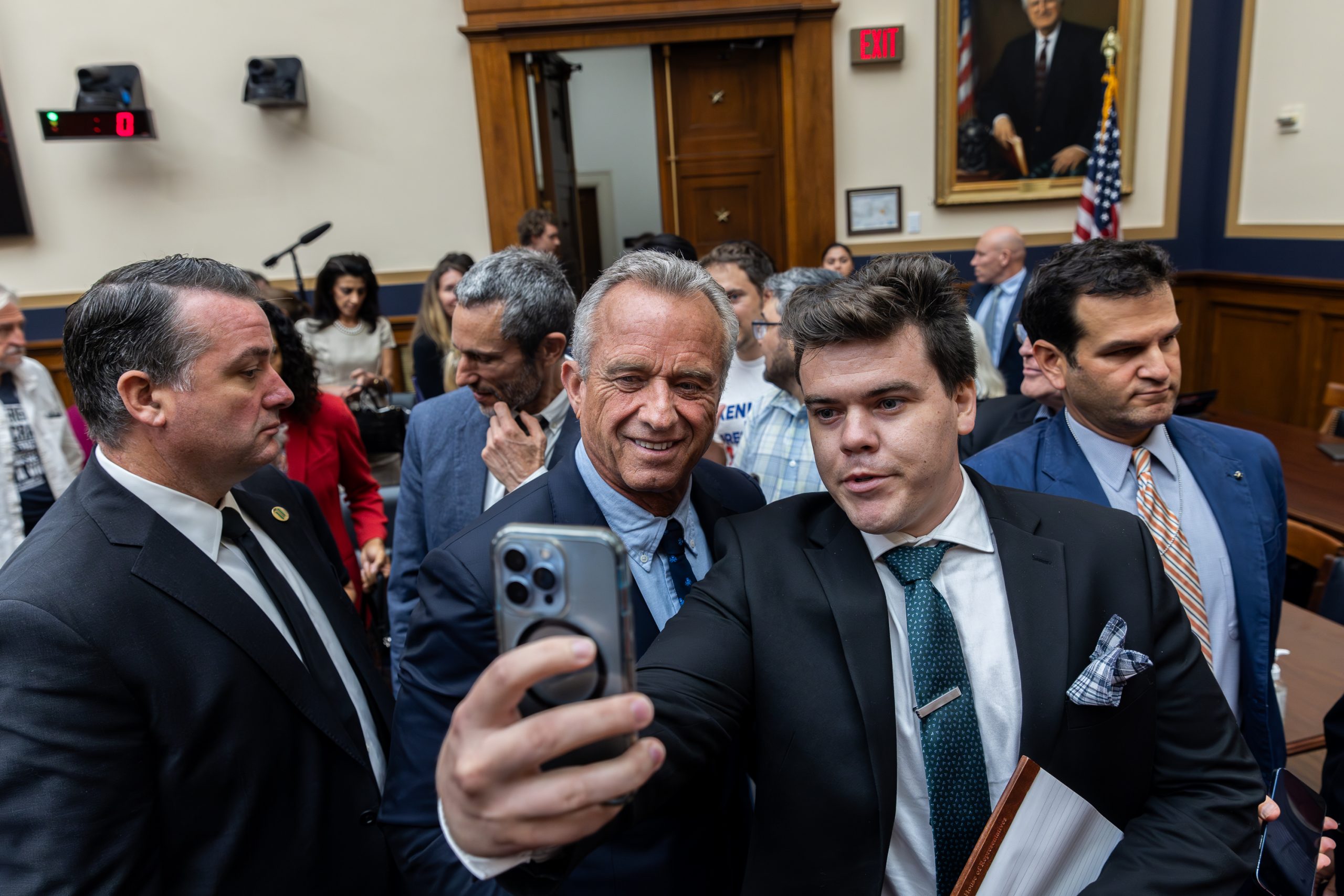 Robert F. Kennedy Jr. takes a selfie with a man at the conclusion of a House Judiciary Select Subcommittee hearing on the Weaponization of the Federal Government on Thursday, July 20, 2023. The hearing focused on allegations of cooperation between big tech companies and government agencies to obstruct free speech.
