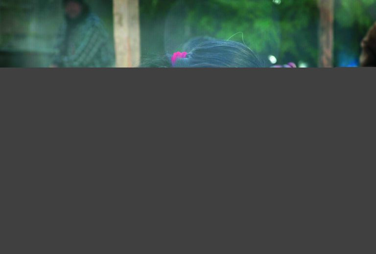 Zoila Gomez cries during the wake for members of the Vasquez family who were buried alive when their house collapsed in San Cristobal Cucho, Guatemala, Thursday, Nov. 8, 2012. The family died when a magnitude 7.4 earthquake struck on Wednesday, collapsing the home of the Vasquez family and burying 10 of them, including a 4-year-old child, in the rubble. The quake killed at least 52 people and left dozens more missing. (AP Photo/Moises Castillo)