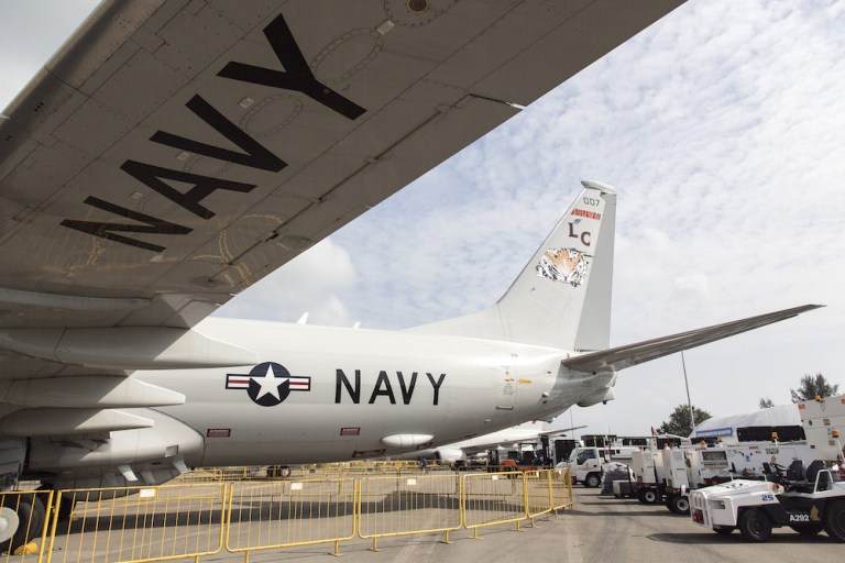 A United States Navy (USN) P-8A Poseidon military aircraft, manufactured by Boeing Co., stands on display during a media preview day at the Singapore Airshow held at the Changi Exhibition Centre in Singapore, on Sunday, Feb. 4, 2018. The air show runs through Feb. 11. 