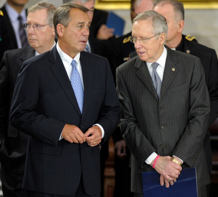House Speaker John Boehner, R-Ohio, and Senate Majority Leader Harry Reid, D-Nev., are locked in a battle over the budget and the Affordable Care Act. (AP File)