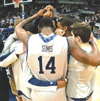 Mitchell Layton/Getty Images
Senior center Henry Sims leads Georgetown with 3.5 assists to go along with 11.8 points and 5.4 rebounds a game this season.