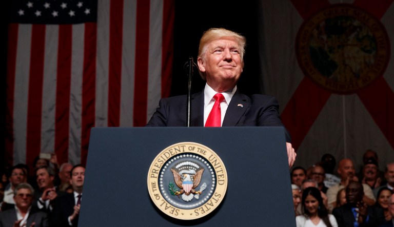 I am currently being accused of being corruptly motivated in making my argument against charging President Trump with obstruction of justice. My emails are filled with such charges. (AP Photo/Evan Vucci)