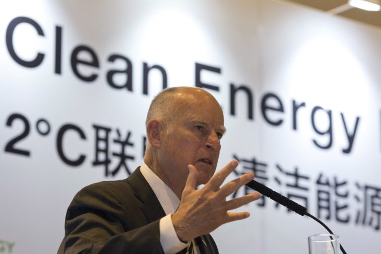 California Gov. Jerry Brown helped form a coalition of states that committed themselves to meeting the goals of the Paris Agreement in response to President Trump's June 1 decision to exit the climate deal. (AP Photo/Ng Han Guan)