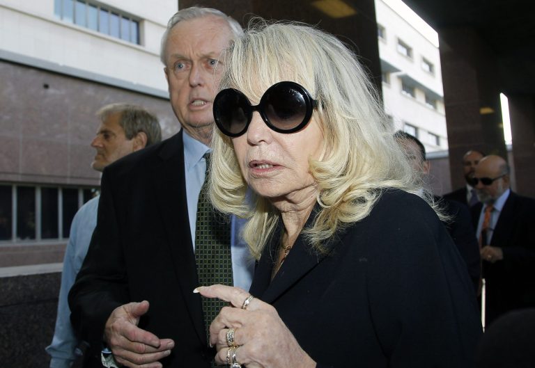 Shelly Sterling, the estranged wife of Los Angeles Clippers owner Donald Sterling, arrives at a Los Angeles courthouse with her attorney Pierce O' Donnell, Monday, July 7, 2014. With the potentially record-breaking $2 billion sale of the Clippers hanging in the balance, a trial beginning Monday will focus on Shelly Sterling had the authority under terms of a family trust to unilaterally negotiate the deal.  (AP Photo/Nick Ut)