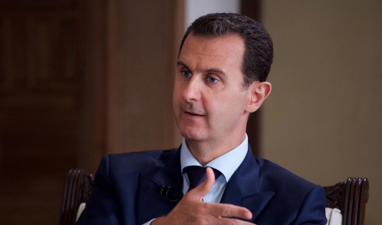 The determination was made after a year-long investigation and was released the same day reports surfaced that Bashar Assad may still have some chemical weapons. (SANA via AP, File)