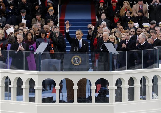 President Barack Obama waves to crowd after his Inaugural speech at the ceremonial swearing-in on the West Front of the U.S. Capitol during the 57th Presidential Inauguration in Washington, Monday, Jan. 21, 2013. (AP Photo/Scott Andrews, Pool)