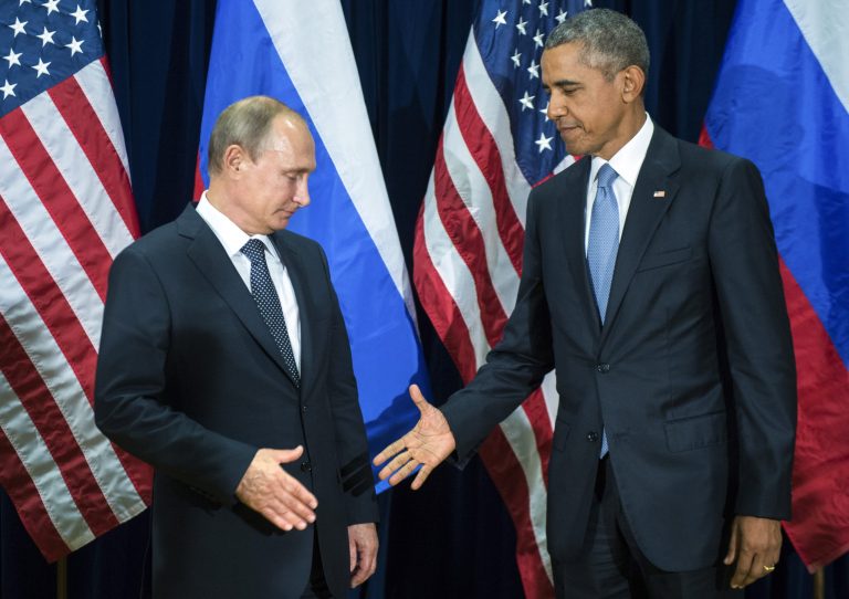 President Obama, right, and Russia's President Vladimir Putin pose for members of the media before a bilateral meeting Monday, Sept. 28, 2015, at United Nations headquarters. (Mikhail Klimentyev/RIA-Novosti, Kremlin Pool Photo via AP)