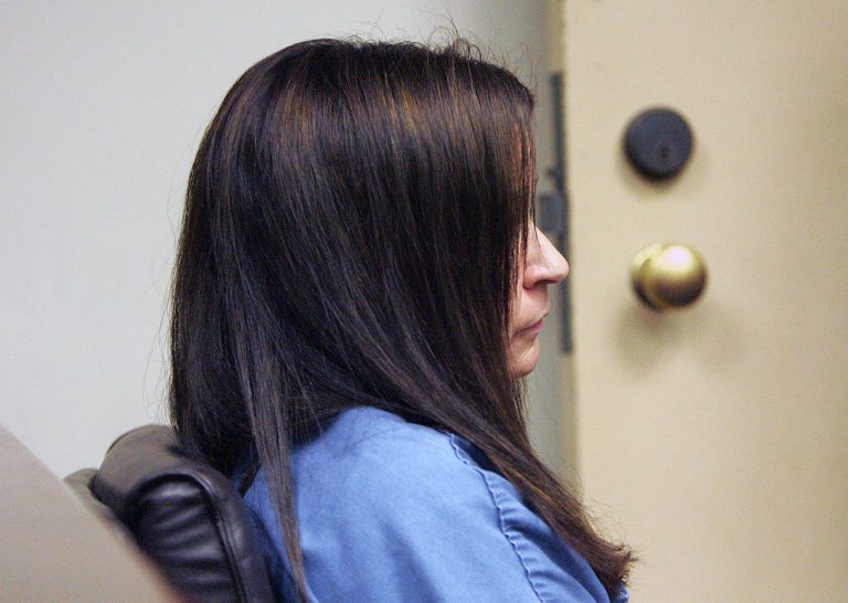 Former Riverside Unified School teacher Andrea Cardosa sits in court as her arraignment is postponed at the Robert Presley Hall of Justice in Riverside, Calif. Wednesday, Feb. 5, 2014. Cardosa, 40, of Perris, is charged with 16 felonies, including aggravated sexual assault of a child, related to two former students. (AP Photo/Terry Pierson/The Press-Enterprise)   MAGS OUT; MANDATORY CREDIT