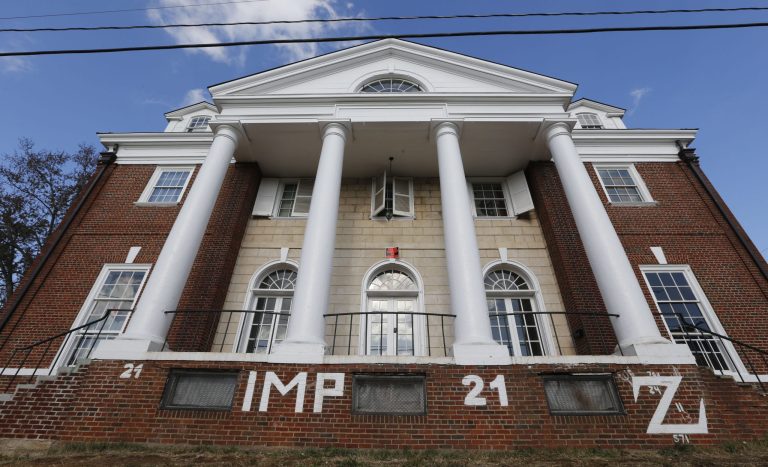 The Phi Kappa Psi fraternity house at the University of Virginia in Charlottesville, Va., Monday, Nov. 24, 2014. A Rolling Stone article last week alleged a gang rape at the house which has since suspended operations. (AP Photo/Steve Helber)