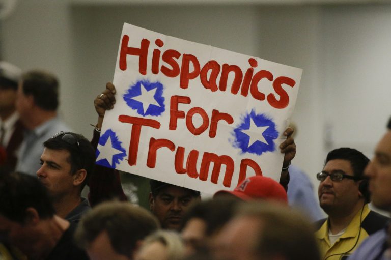 A Hispanic supporter holds up a sign for Republican presidential candidate Donald Trump during a rally at the Anaheim Convention Center, Wednesday, May 25, 2016, in Anaheim, Calif. (AP Photo/Jae C. Hong)