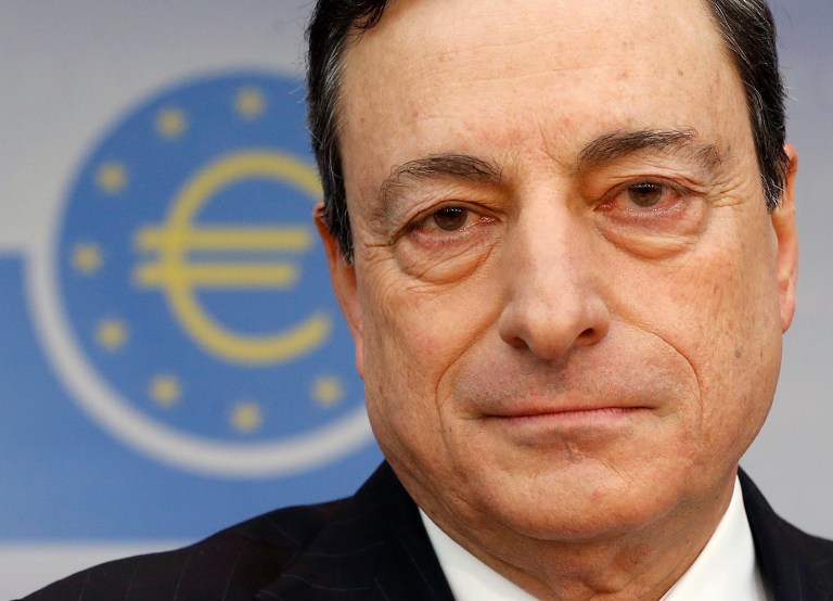 President of European Central Bank Mario Draghi waits for the beginning of a press conference following the meeting of the governing council in Frankfurt, Germany, Thursday, Feb. 6, 2014.  The European Central Bank has left its benchmark interest rate unchanged, holding off on more stimulus despite weak economic growth and low inflation. The bank's 24-member governing council left the rate at 0.25 percent at a meeting in Frankfurt, Germany. Some analysts had thought the eurozone's monetary authority might cut the rate to 0.1 percent to try to boost growth more. (AP Photo/Michael Probst)