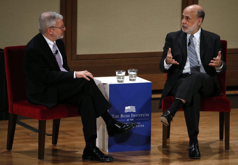Former Federal Reserve Chief Ben Bernanke, right, answers questions during a discussion with Joshua Bolten, managing director Rock Creek Global Advisors, on Monday, May 19, 2014, at the George W. Bush Presidential Center in Dallas. They discussed monetary policy and the economy. (AP Photo/The Dallas Morning News, David Woo) MANDATORY CREDIT; MAGS OUT; TV OUT; INTERNET USE BY AP MEMBERS ONLY; NO SALES.