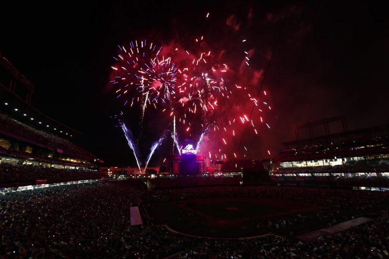 Fireworks explode over Coors Field to mark the Independence Day holiday after the Colorado Rockies hosted the Cincinnati Reds in a baseball game Monday, July 3, 2017, in Denver. The Rockies won 5-3. (AP Photo/David Zalubowski)