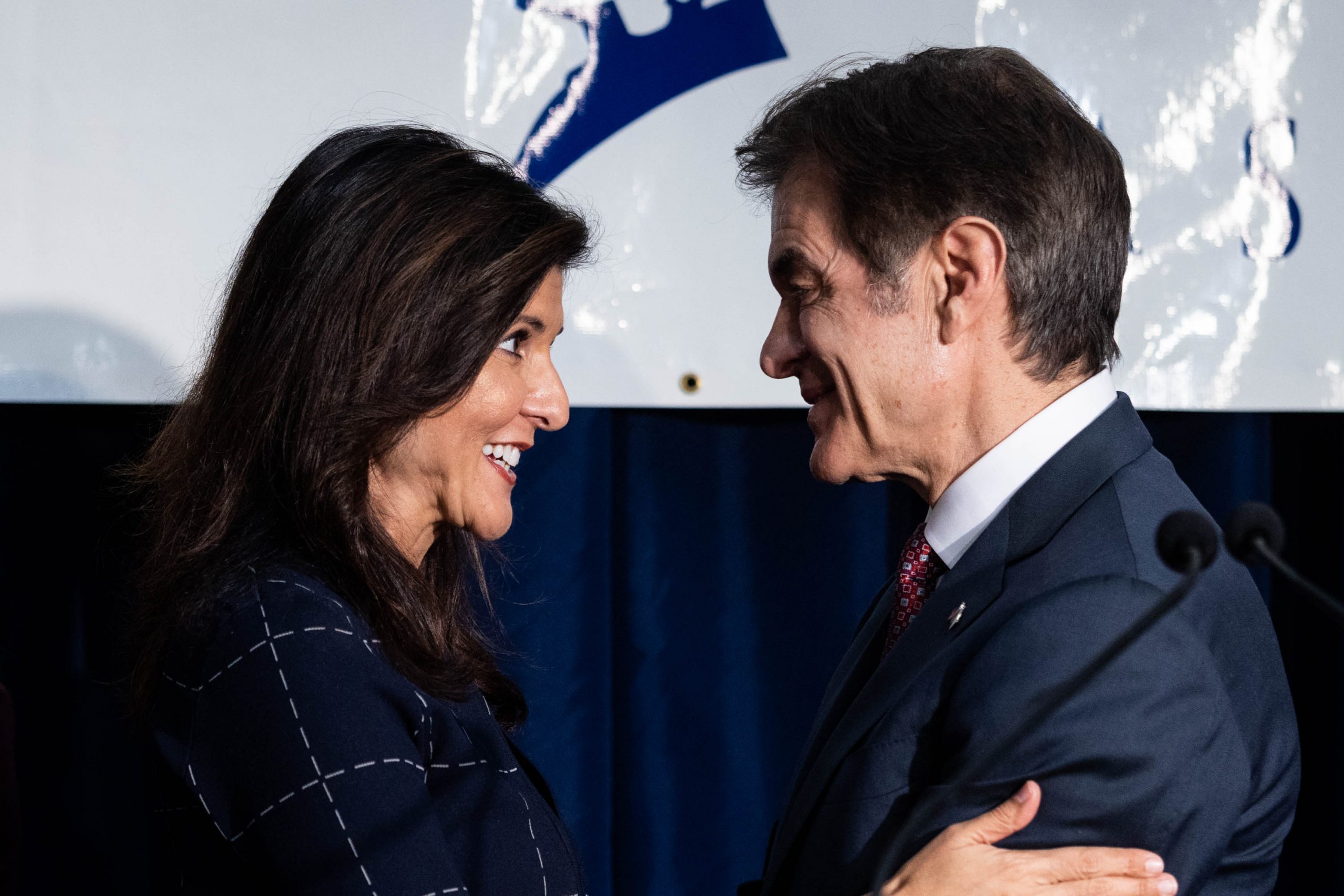 Former U.S. Ambassador to the U.N. and founder of Stand for America PAC Nikki Haley shares a moment with Mehmet Oz, the Republican candidate for Senate in Pennsylvania, at a campaign rally in Harrisburg, Pennsylvania, on Wednesday, Oct. 26, 2022.