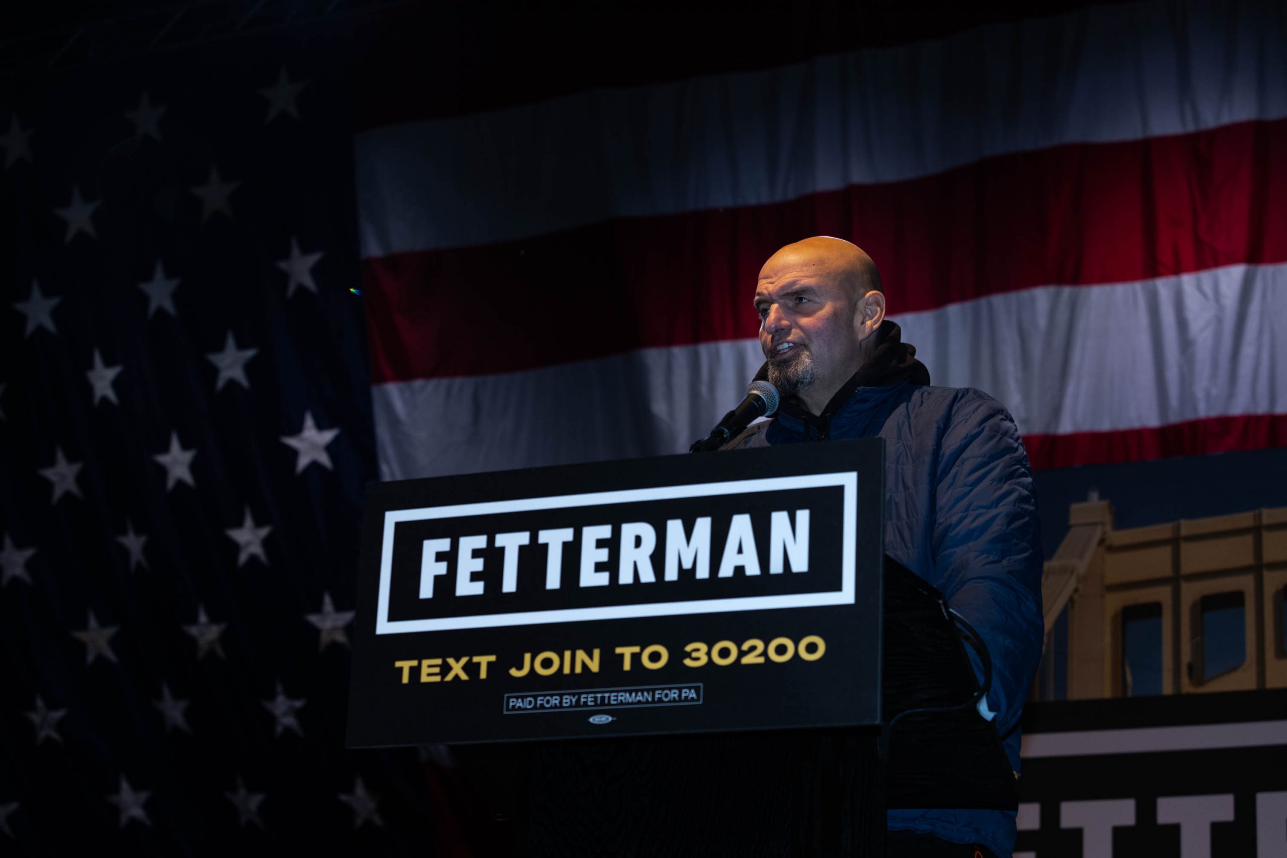Democratic candidate for Senate John Fetterman speaks during a campaign event featuring a performance by Dave Matthews in Pittsburgh, Pennsylvania, on Wednesday, Oct. 26, 2022.