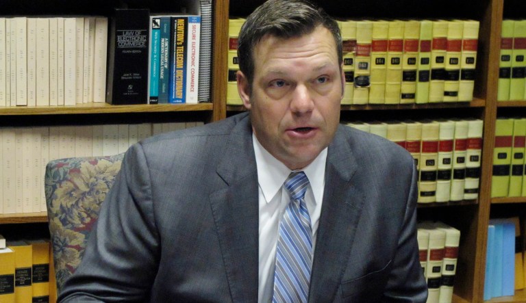 Kris Kobach, the vice chair of President Trump's voter fraud commission, indicated to the Trump transition team last year he was readying a proposal to change federal law to allow the implementation of a proof-of-citizenship requirement during the voter registration process. (AP Photo/John Hanna)