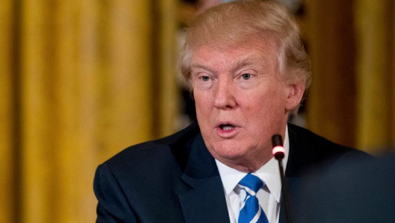 "Rasmussen and others have my approval ratings at around 50%, which is higher than Obama, and yet the political pundits love saying my approval ratings are 'somewhat low.' They know they are lying when they say it. Turn off the show - FAKE NEWS!" the president tweeted. (AP Photo/Andrew Harnik)