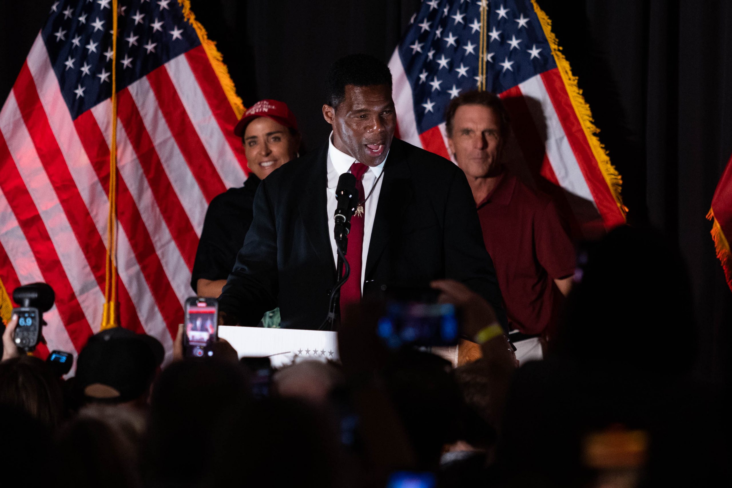 Republican senate candidate Herschel Walker speaks onstage at his campaign election night party in Atlanta, Georgia, Tuesday, November, 8, 2022,