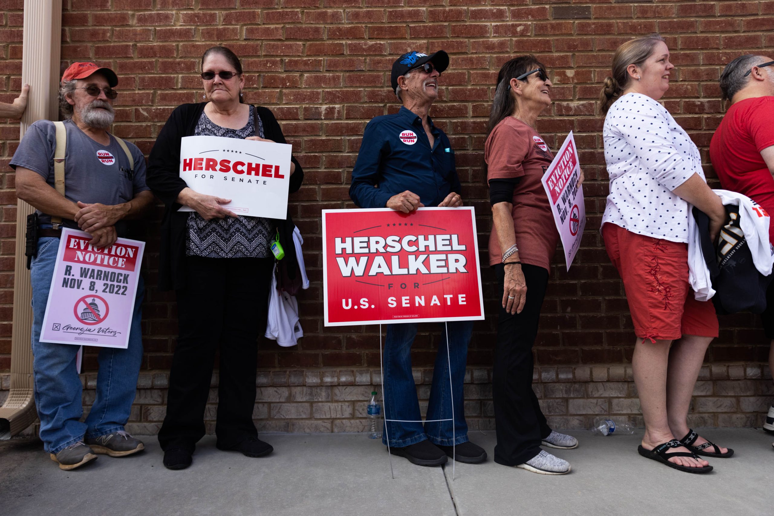 Supporters of Senate candidate Herschel Walker, at a  campaign rally, in Hiram, Georgia, Sunday, November 6, 2022. Walker is challenging Sen. Raphael Warnock for his Senate seat.