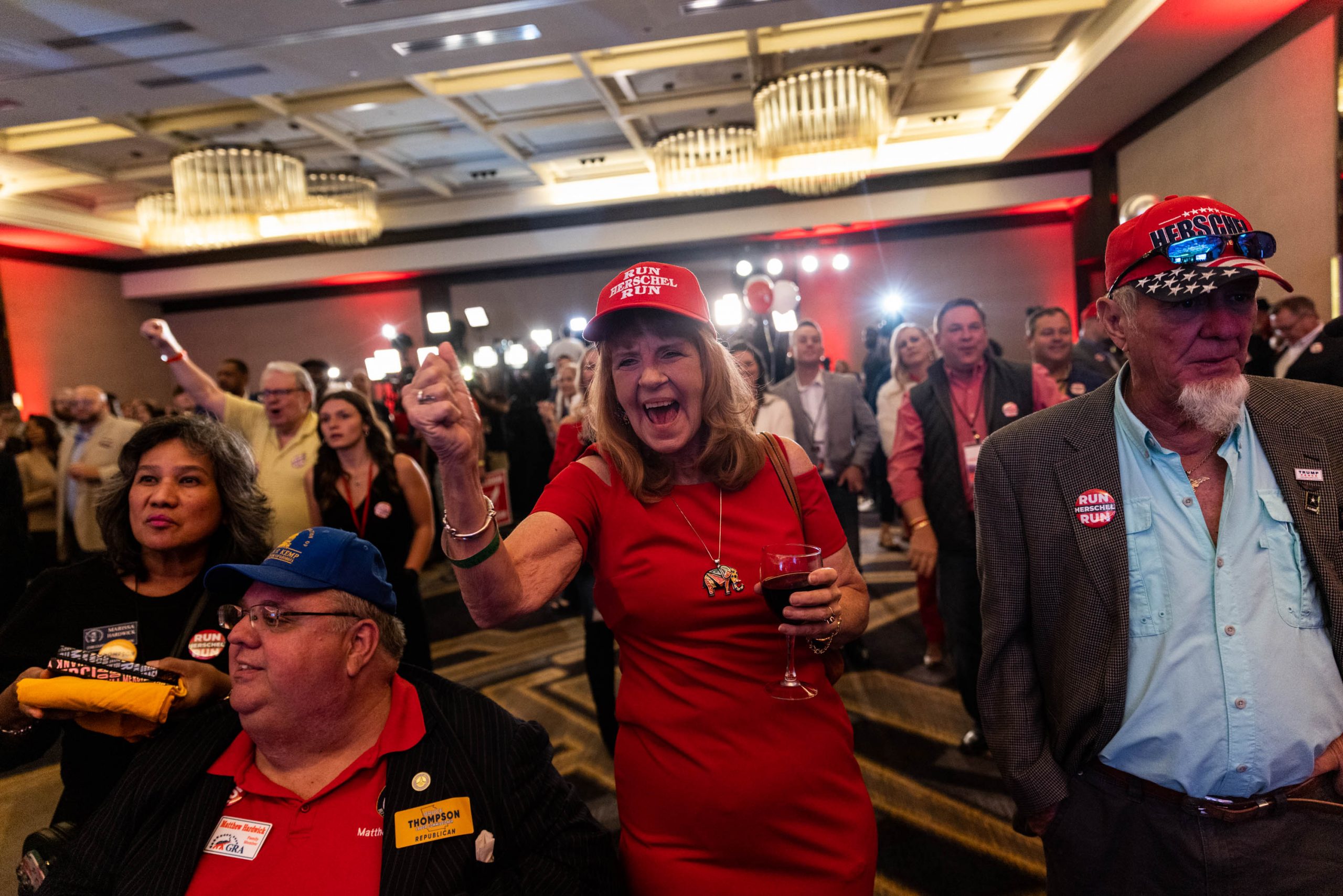 Supporters of Republican senate candidate Herschel Walker, at a campaign election night party in Atlanta, Georgia, Tuesday, November, 8, 2022, 