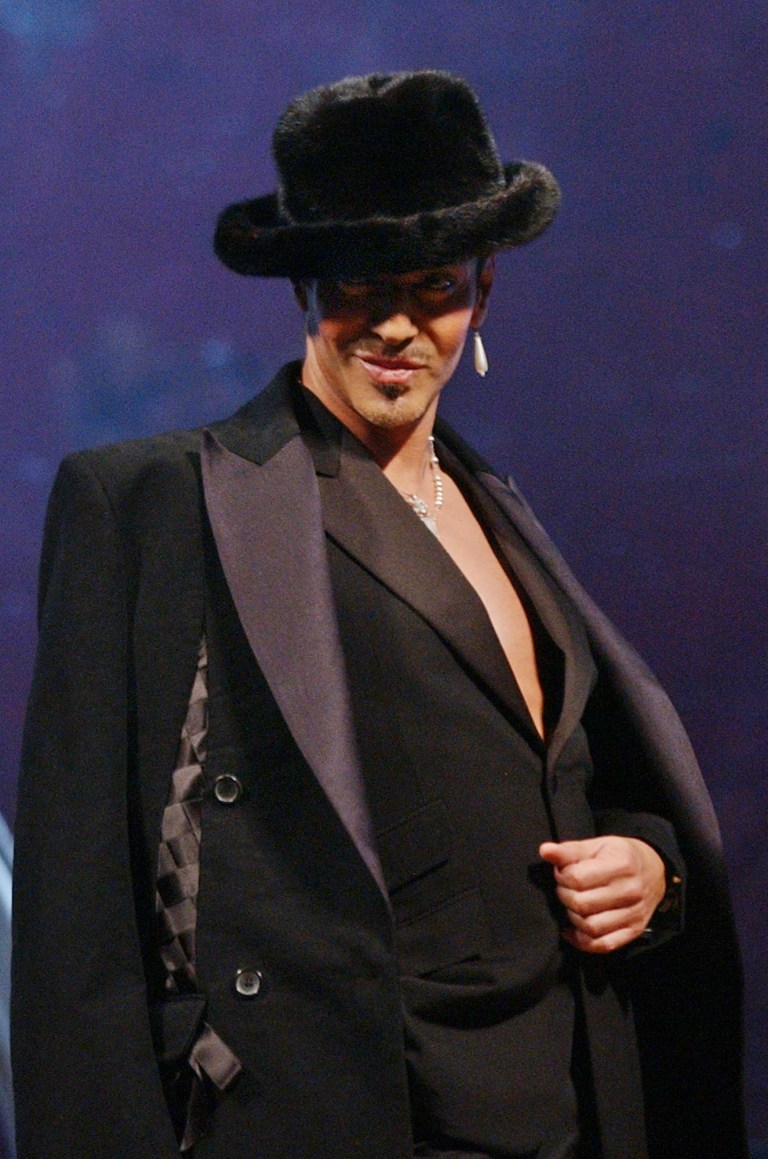 FILE - In this July 2, 2004 file photo, British fashion designer John Galliano appears after the presentation of his Spring/Summer 2005 men's fashion show, in Paris. Israel's national broadcast authority has banned the country's contestant in the upcoming Eurovision contest from wearing a dress made by John Galliano, citing an anti-semitic rant by the celebrity designer two years ago. There's only one problem: Galliano says he never offered to make the dress. (AP Photo/Jacques Brinon)