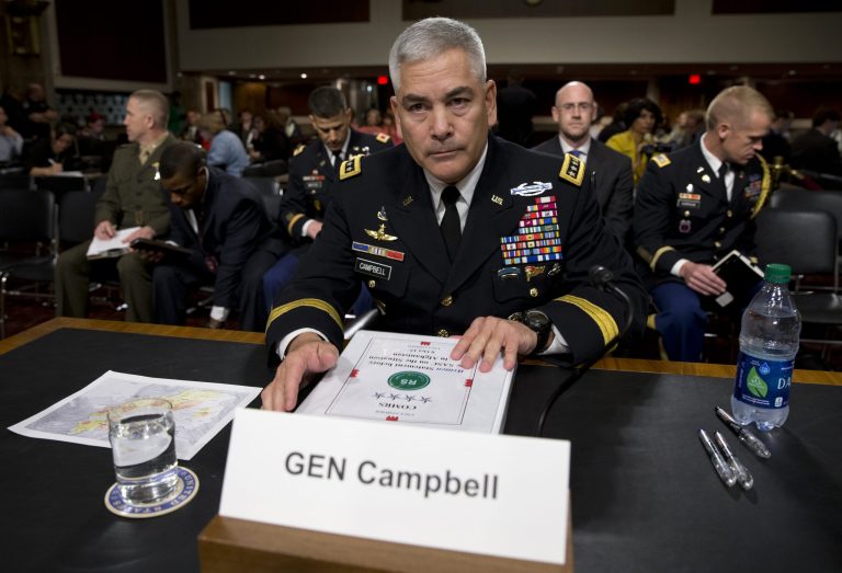 U.S. Forces-Afghanistan Resolute Support Mission Commander Gen. John Campbell takes his seat on Capitol Hill in Washington, Tuesday, Oct. 6, 2015, prior to testifying before the Senate Armed Services Committee hearing on the Situation in Afghanistan. (AP Photo/Carolyn Kaster)
