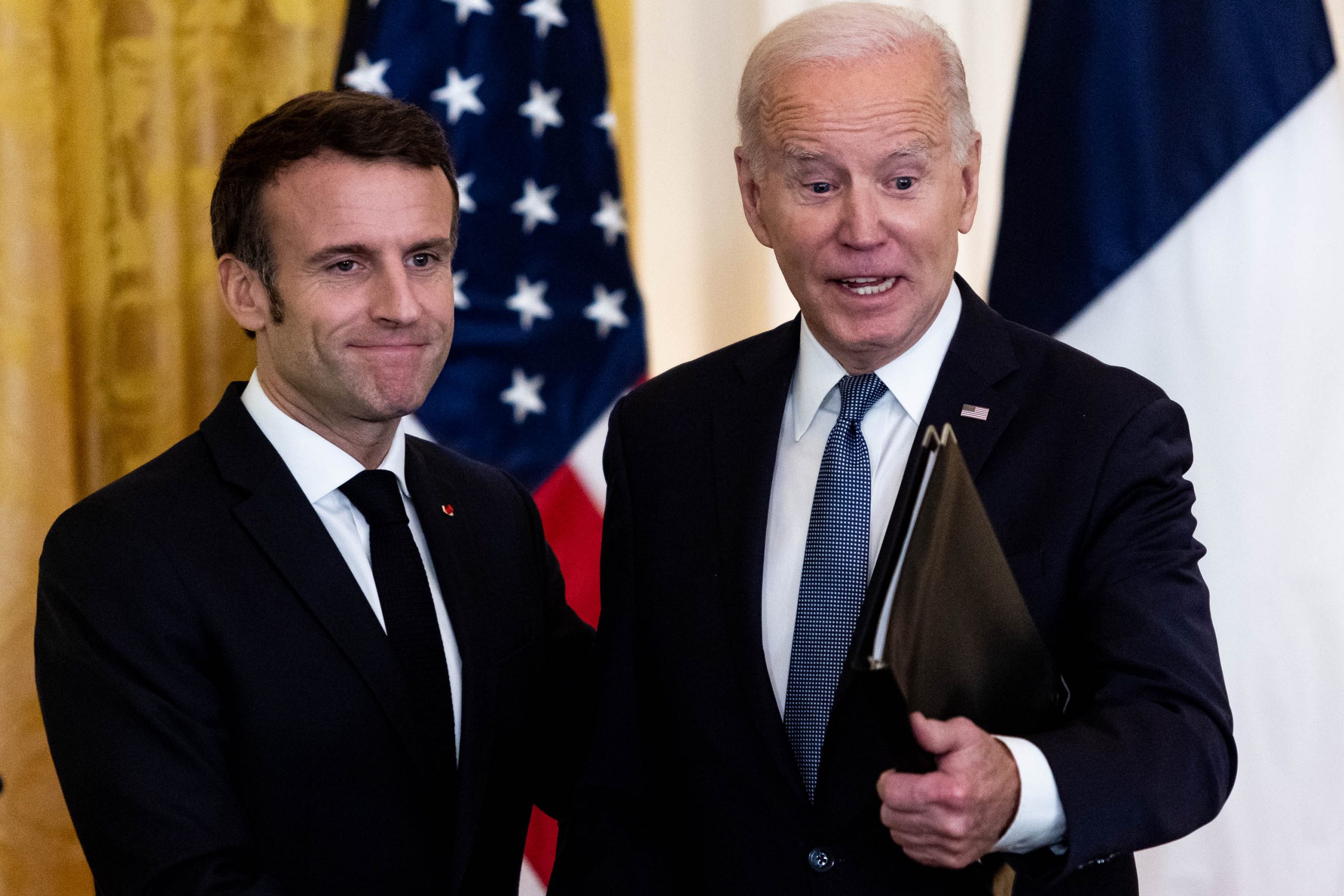 French President Emannuel Macron and President Joe Biden participate in a joint press conference inside the East Room at the White House, Thursday, December 1, 2022