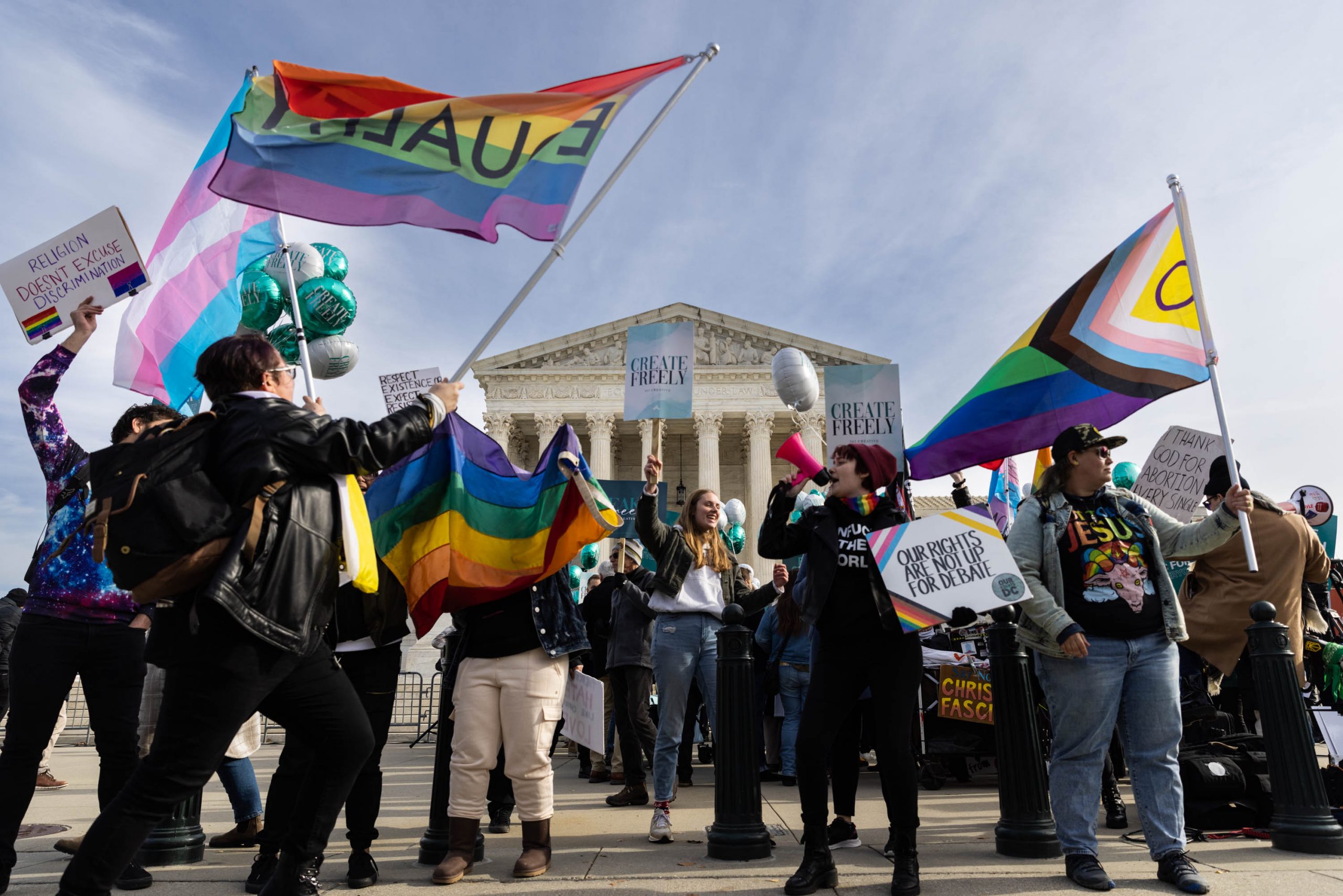 Supporters of web designer Lorie Smith and counter-protesters demonstrate in front of the U.S. Supreme Court Building, December 05, 2022 in Washington, DC. The Court heard oral arguments from cases including one involving Lorie Smith, the owner of 303 Creative, a website design company in Colorado who refuses to create websites for same-sex weddings despite a state anti-discrimination law. 