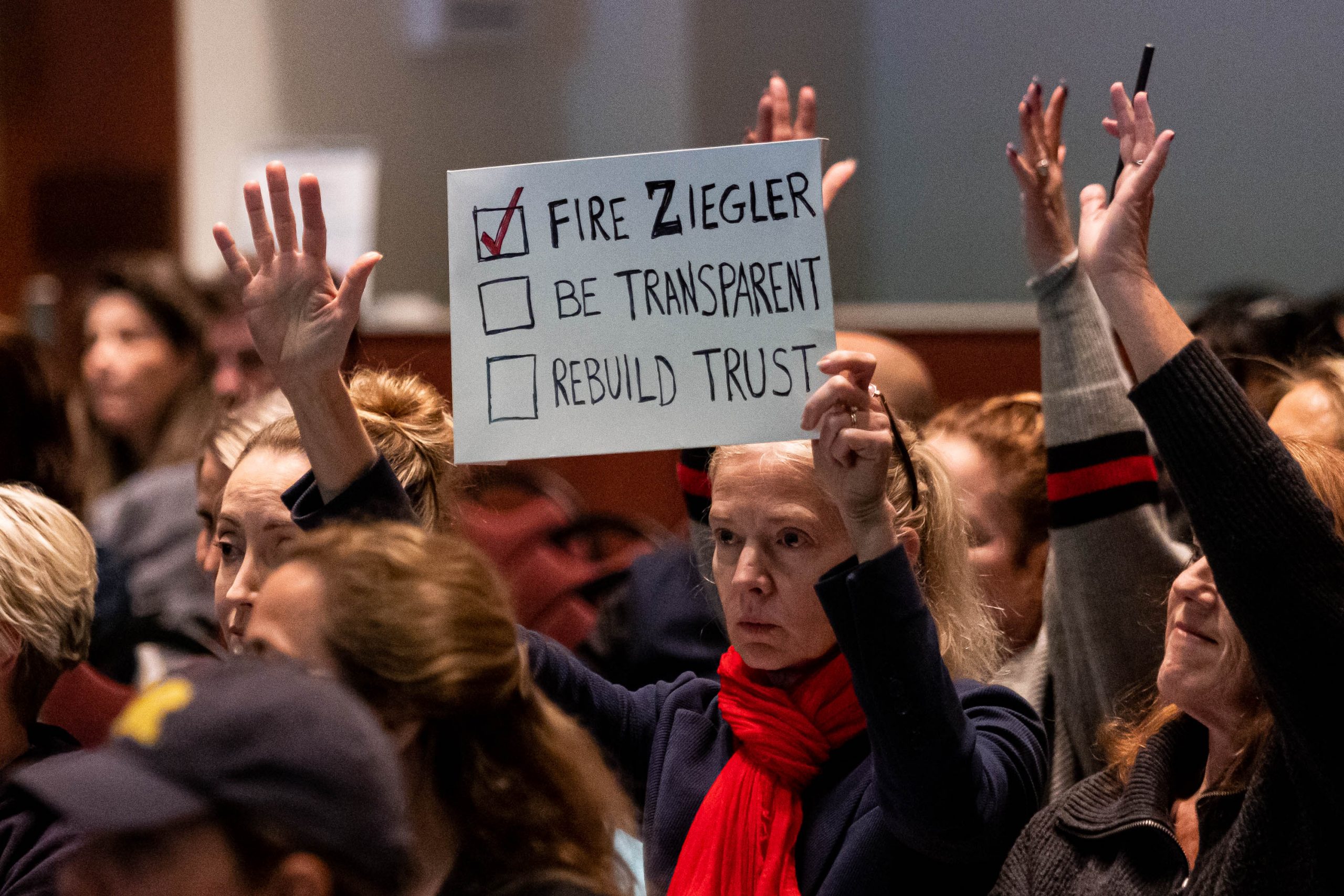 Parents and stakeholders attend a Loudoun County School Board meeting in Virginia, Tuesday, December 13, 2022. It was the first meeting in response to a grand jury's recommendations regarding how the school system handled two sexual assaults committed by the same student last year. The meeting happened the same day that former superintendent Scott Ziegler had his first court appearance after being indicted by the grand jury.