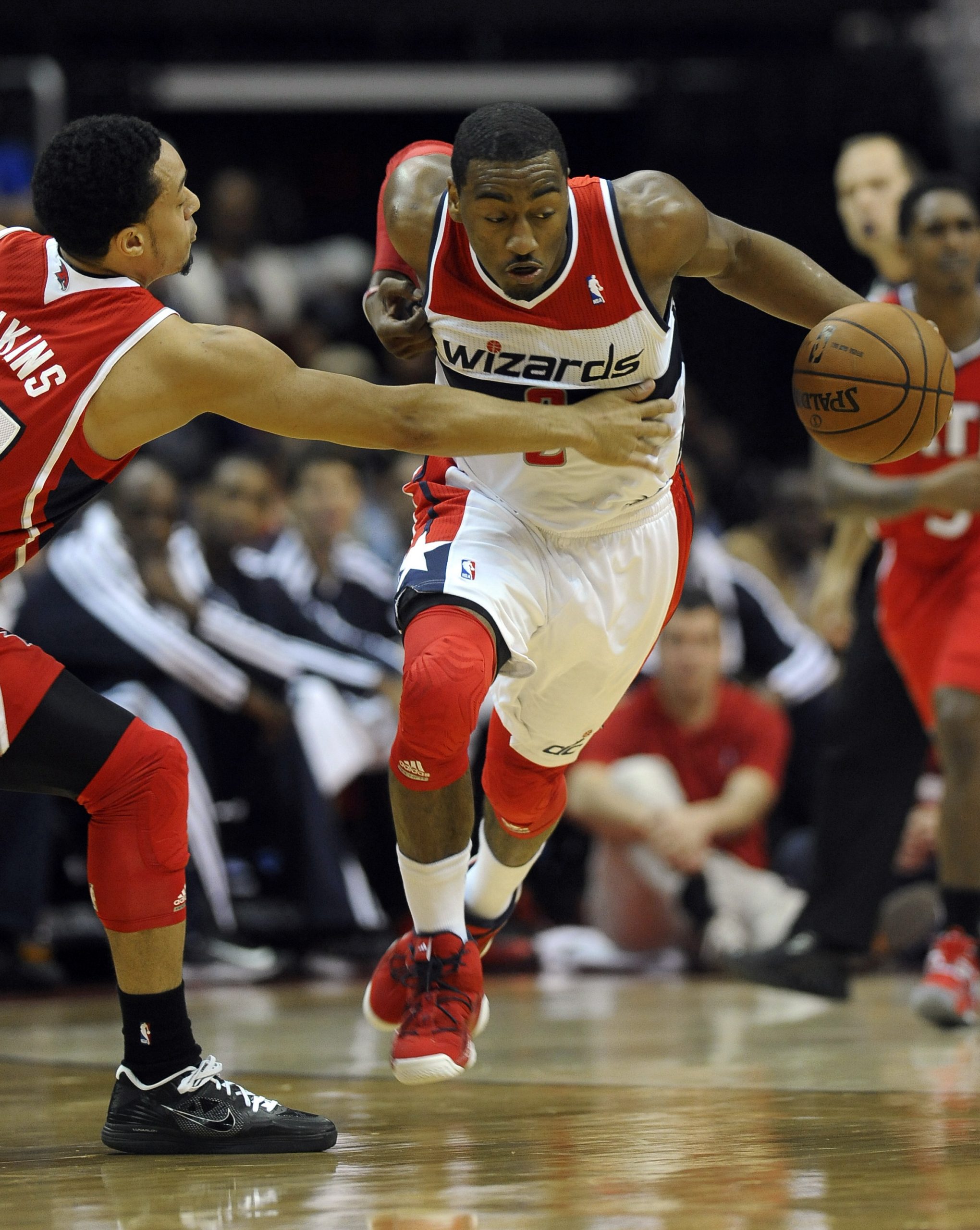 John Wall leads Wizards to win in season debut